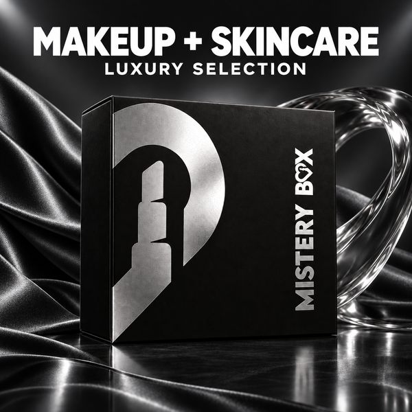 Mystery Box Makeup e Skincare Luxury Selection, scatola nera chiusa con stampa argento in una scenografia nera, grafite e argento; contenuto non mostrato.